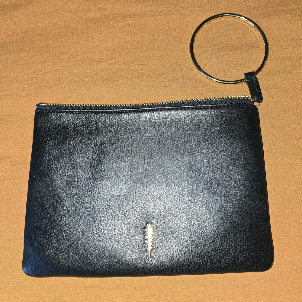 Thacker Black Leather Clutch with Gold Ring